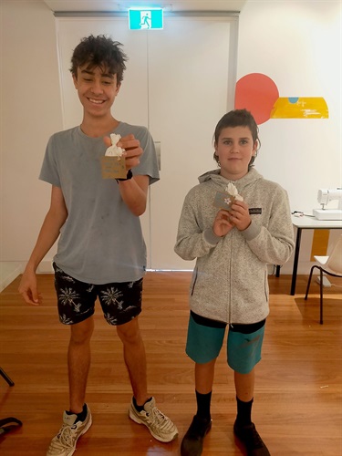 Teenage boys with their eco products