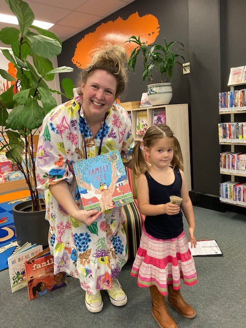 Librarian and a child at National Simultaneous Storytime 2022 